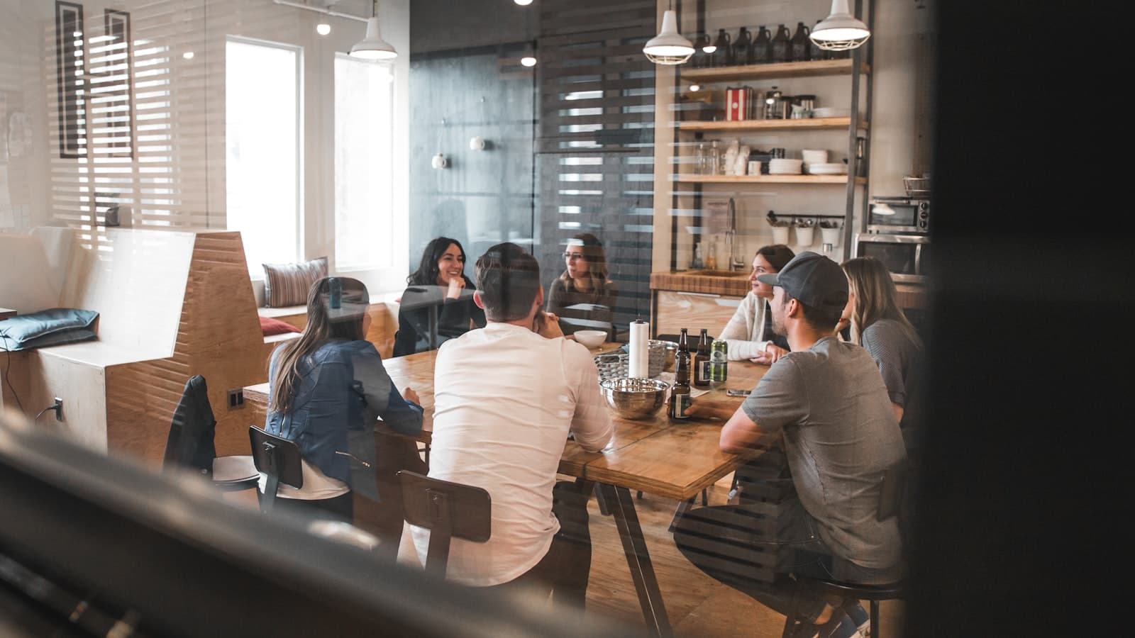 Photo: Unsplash People working and talking in a relaxed office cafe area