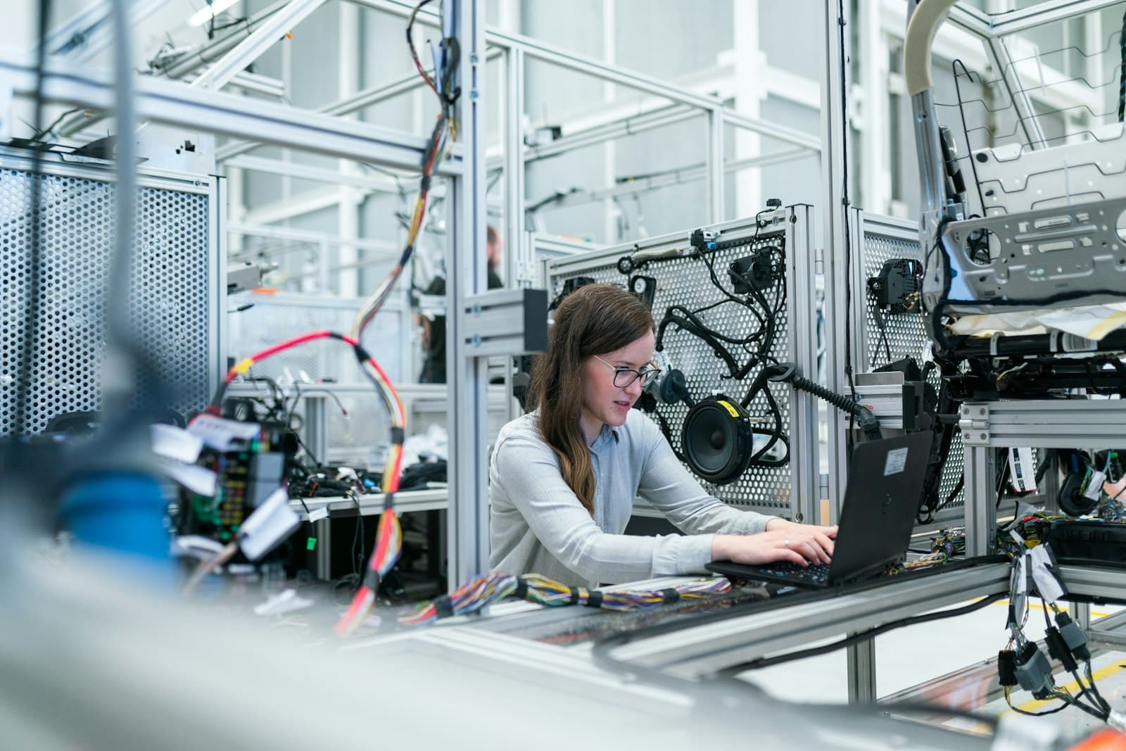 Photo: ThisisEngineering RAEng, Unsplash An engineer working at an automated production machine