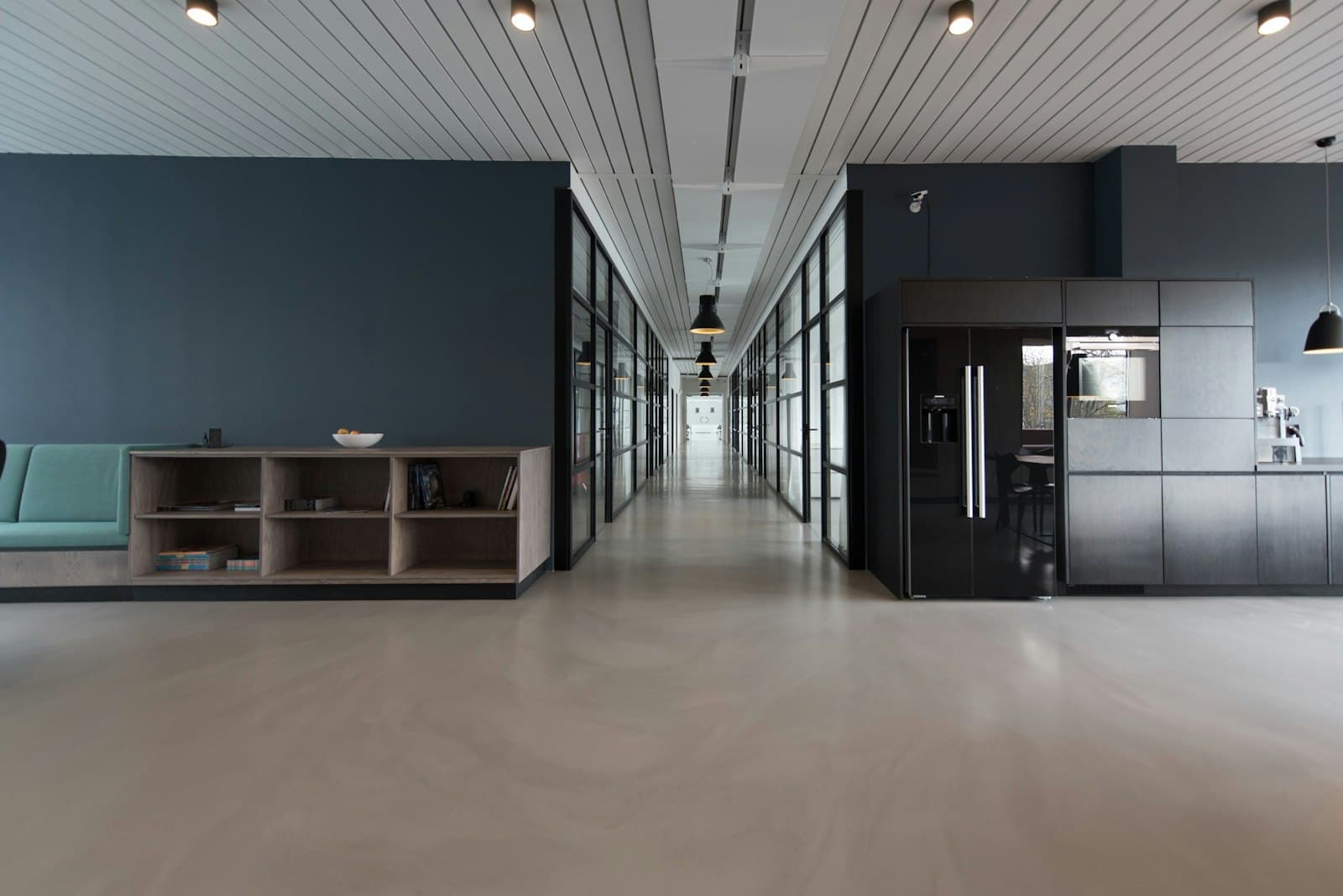 Photo: Nastuh Abootalebi, Unsplash A quiet modern office corridor