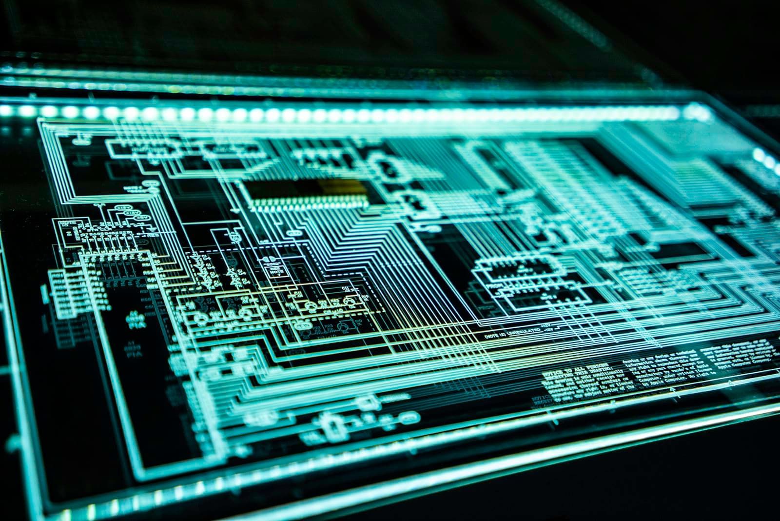 Photo: Franck, Unsplash A blueprint of an electronic circuit lit in blue